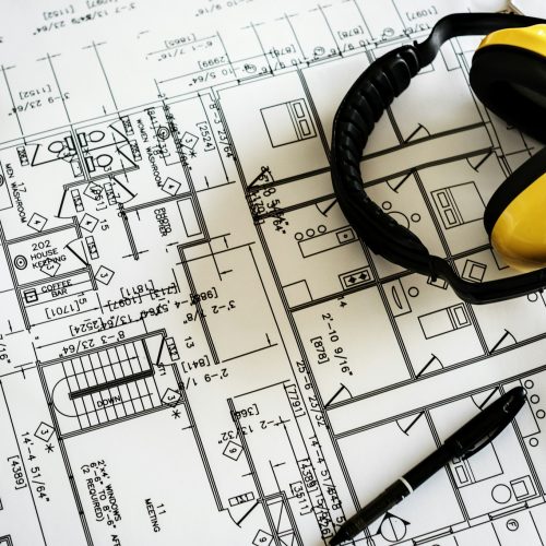 Blueprint and earmuffs